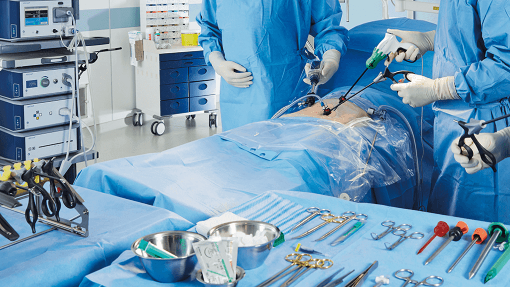 Minimally invasive GI surgery being performed in a sterile operation theatre using laparoscopic tools