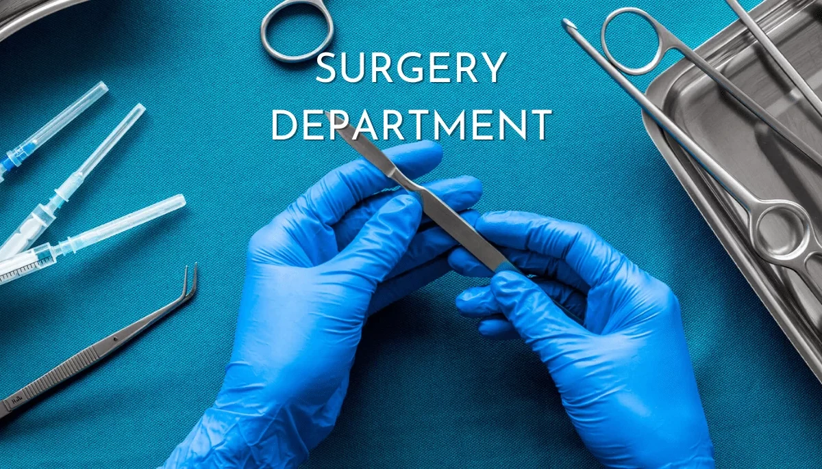Surgical tools and gloved hands preparing for surgery at Care and Cure Hospital Ahmedabad